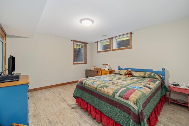 23148 Glenhaven Dr, Nevis, MN 56467 - bedroom with light wood finished floors and baseboards