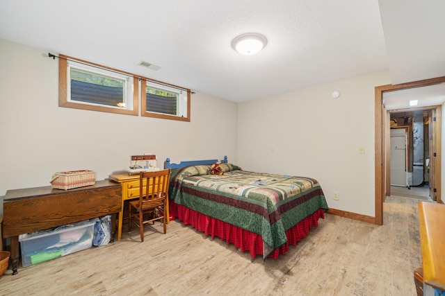 23148 Glenhaven Dr, Nevis, MN 56467 - bedroom with wood finished floors and baseboards