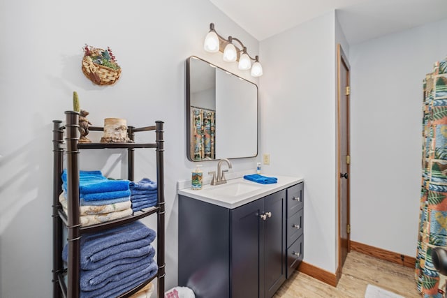 23148 Glenhaven Dr, Nevis, MN 56467 - bathroom featuring vanity and wood finished floors