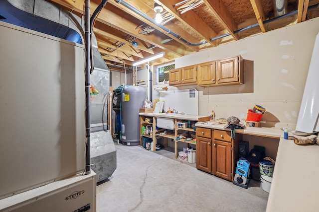 23148 Glenhaven Dr, Nevis, MN 56467 - basement featuring water heater, refrigerator, and a workshop area