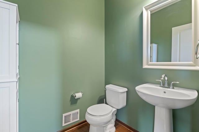 17393 54th St NE, Otsego, MN 55374 - half bath featuring toilet and wood finished floors
