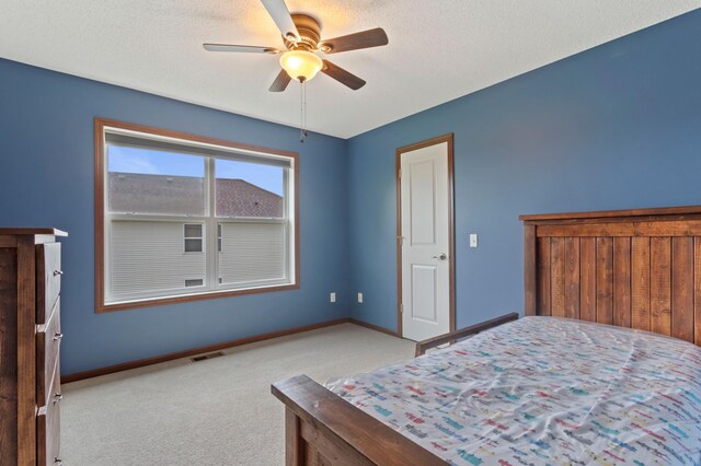 17393 54th St NE, Otsego, MN 55374 - carpeted bedroom with baseboards and ceiling fan