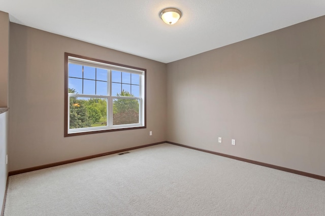 17393 54th St NE, Otsego, MN 55374 - unfurnished room with baseboards and light colored carpet