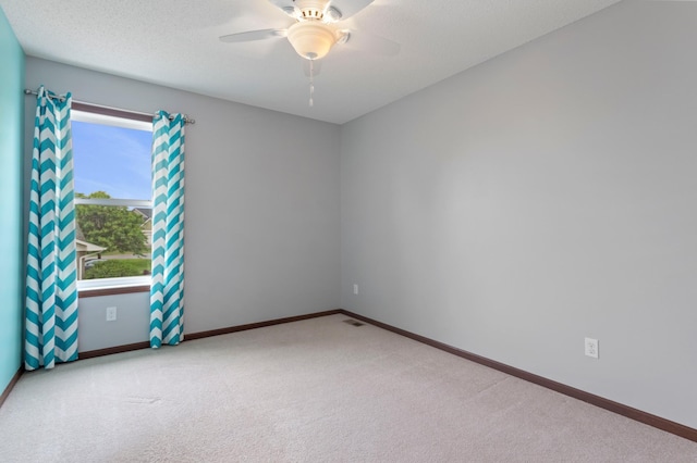 17393 54th St NE, Otsego, MN 55374 - carpeted empty room with a ceiling fan and baseboards