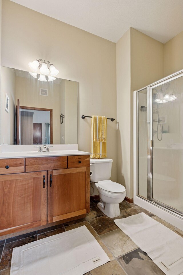 270 4th St E Unit 509, Saint Paul, MN 55101 - full bath with stone tile floors, a stall shower, and vanity