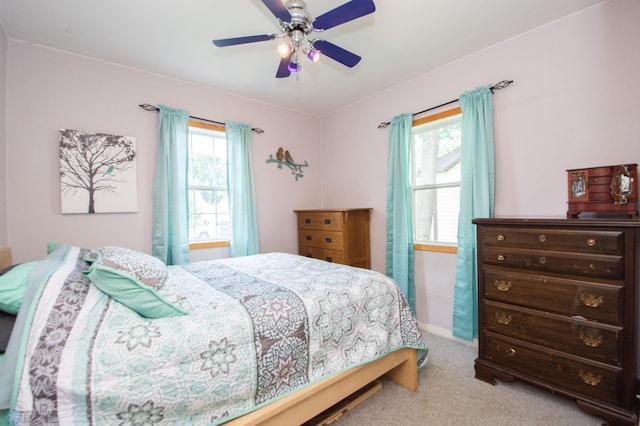 1530 11th Ave S, Fargo, ND 58103 - bedroom with carpet, multiple windows, and ceiling fan