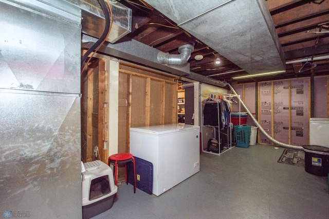 1530 11th Ave S, Fargo, ND 58103 - unfinished below grade area featuring fridge