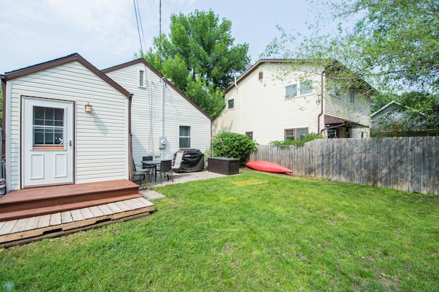 1530 11th Ave S, Fargo, ND 58103 - fenced yard featuring a wooden deck