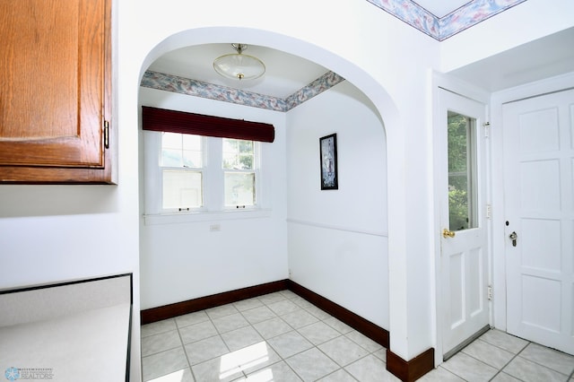 1321 4th St N, Fargo, ND 58102 - foyer entrance with light tile patterned floors and arched walkways