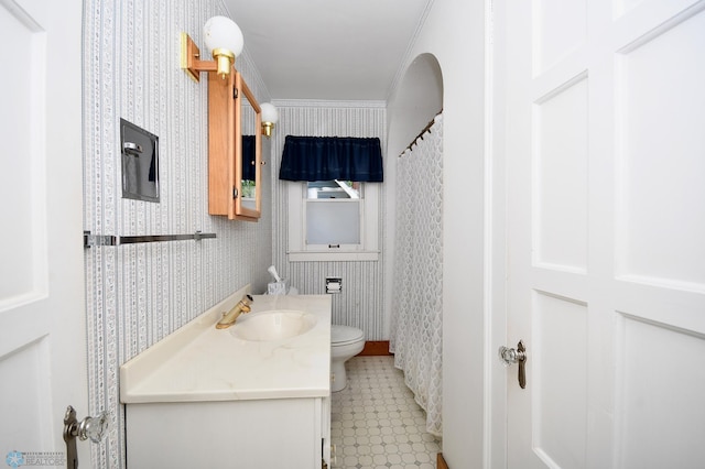 1321 4th St N, Fargo, ND 58102 - full bathroom with wallpapered walls, vanity, tile patterned floors, and crown molding