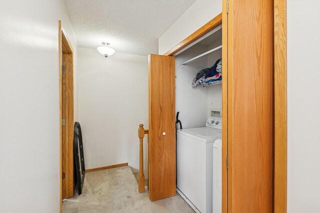 8829 Branson Dr Unit 46, Inver Grove Heights, MN 55076 - washroom featuring light carpet, a textured ceiling, and washer and dryer