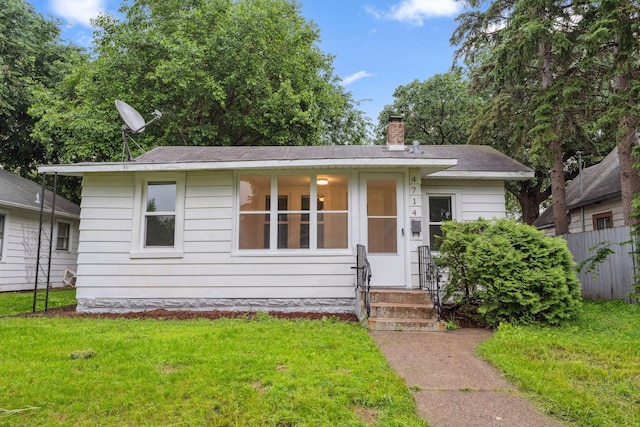 4714 Aldrich Ave N, Minneapolis, MN 55430 - view of front of house with a chimney