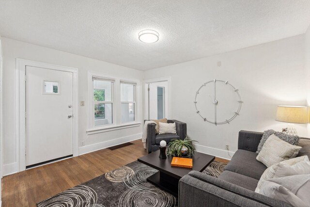 4714 Aldrich Ave N, Minneapolis, MN 55430 - living area with dark wood-style flooring and a textured ceiling
