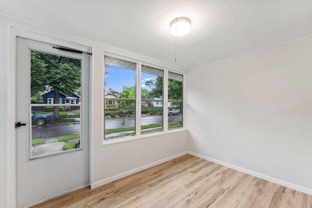 4714 Aldrich Ave N, Minneapolis, MN 55430 - spare room featuring light wood-style floors and healthy amount of natural light