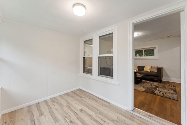 4714 Aldrich Ave N, Minneapolis, MN 55430 - unfurnished room with wood finished floors and baseboards