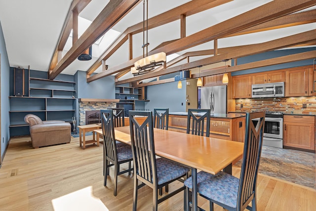 1803 Hubbard Ave, Saint Paul, MN 55104 - dining room with light wood finished floors and a chandelier