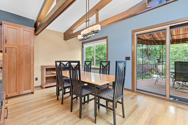 1803 Hubbard Ave, Saint Paul, MN 55104 - dining room featuring light wood-style flooring and a chandelier
