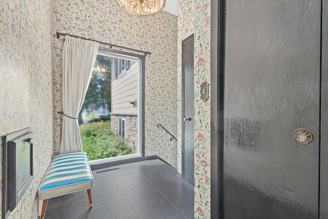 1803 Hubbard Ave, Saint Paul, MN 55104 - doorway with wallpapered walls and baseboards