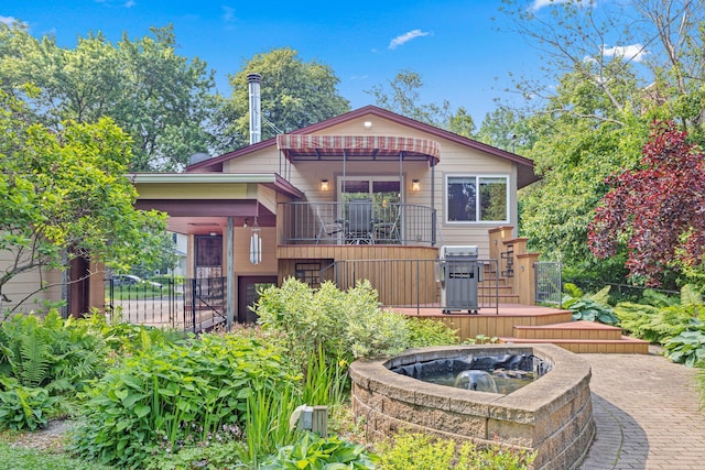 1803 Hubbard Ave, Saint Paul, MN 55104 - view of front of house featuring a deck and a balcony