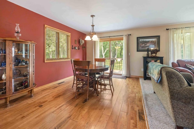 7270 Stone Rdg, Crow Wing Twp, MN 56401 - dining space with light wood-style floors and baseboards