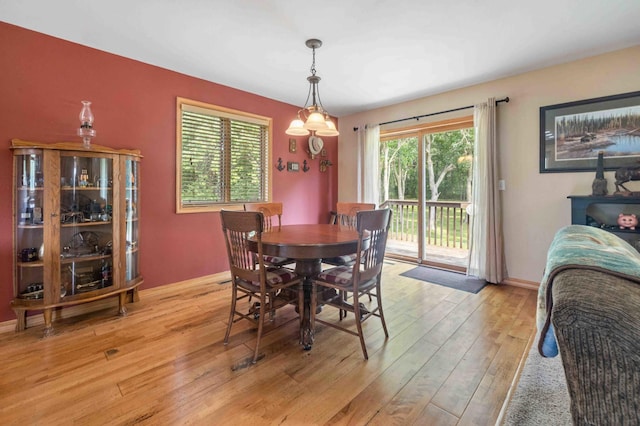 7270 Stone Rdg, Crow Wing Twp, MN 56401 - dining area with light wood-style floors and baseboards