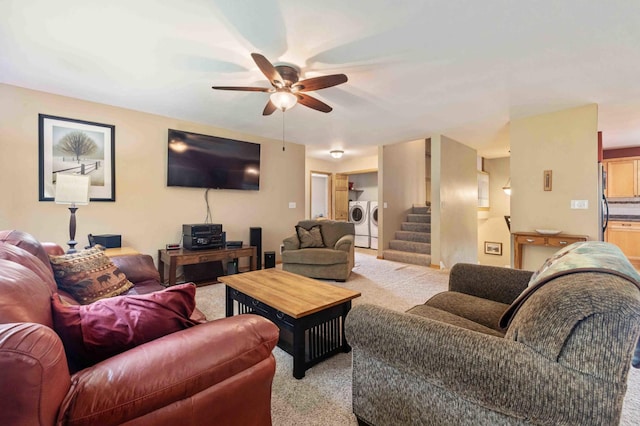 7270 Stone Rdg, Crow Wing Twp, MN 56401 - living room featuring separate washer and dryer, light colored carpet, a ceiling fan, and stairs