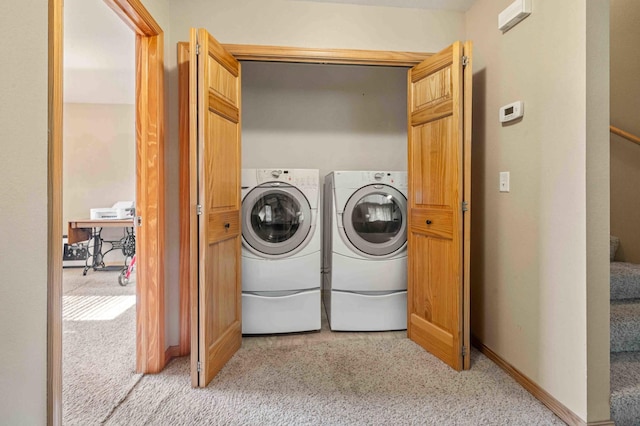 7270 Stone Rdg, Crow Wing Twp, MN 56401 - laundry area with light carpet and washing machine and clothes dryer