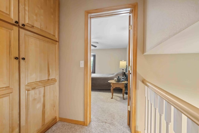 7270 Stone Rdg, Crow Wing Twp, MN 56401 - hallway featuring light colored carpet and baseboards