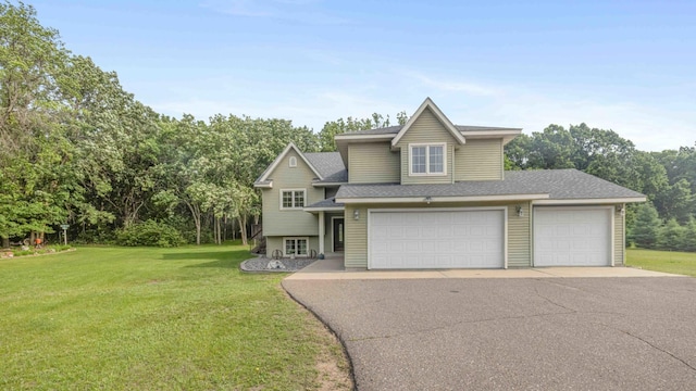 7270 Stone Rdg, Crow Wing Twp, MN 56401 - view of front facade with a front lawn, a shingled roof, driveway, and view of scattered trees