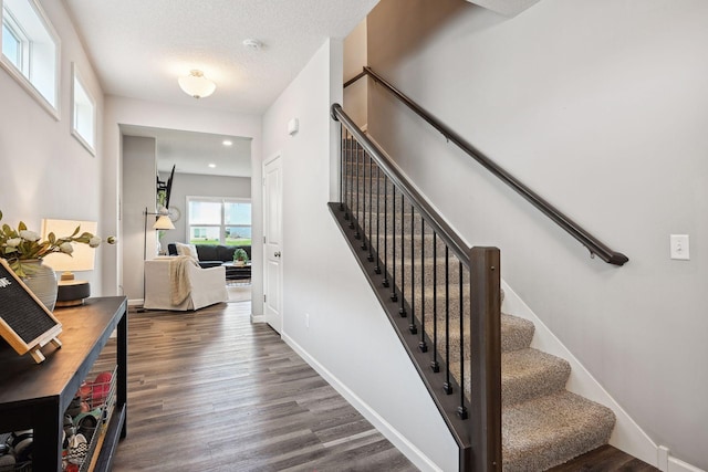 9266 26th St NE, Saint Michael, MN 55376 - stairway with wood finished floors and recessed lighting
