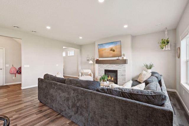 9266 26th St NE, Saint Michael, MN 55376 - living area with wood finished floors, recessed lighting, a fireplace, and healthy amount of natural light