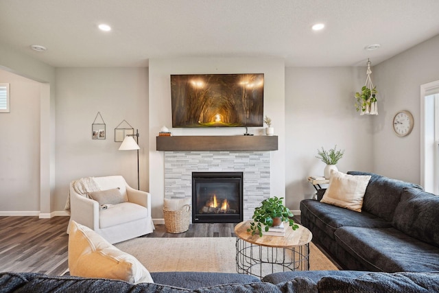 9266 26th St NE, Saint Michael, MN 55376 - living area featuring wood finished floors, a fireplace, and recessed lighting