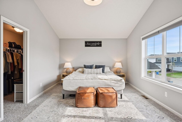 9266 26th St NE, Saint Michael, MN 55376 - carpeted bedroom featuring vaulted ceiling and a spacious closet