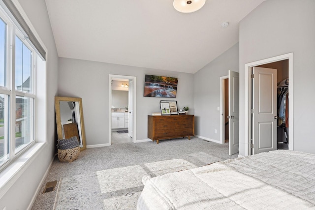 9266 26th St NE, Saint Michael, MN 55376 - bedroom with vaulted ceiling, carpet flooring, and ensuite bathroom