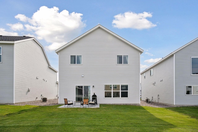 9266 26th St NE, Saint Michael, MN 55376 - rear view of house featuring a patio area and a lawn