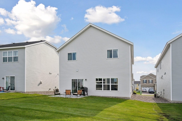 9266 26th St NE, Saint Michael, MN 55376 - rear view of property with a lawn and a patio area