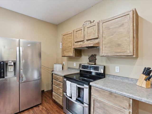 25935 310th St, Sebeka, MN 56477 - kitchen with appliances with stainless steel finishes, under cabinet range hood, dark wood-style floors, light countertops, and light brown cabinetry