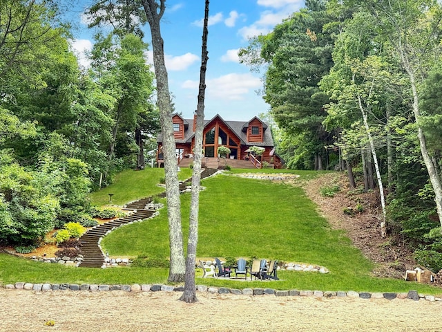 49512 202nd Pl, Shamrock Twp, MN 55760 - view of front of home with a front lawn
