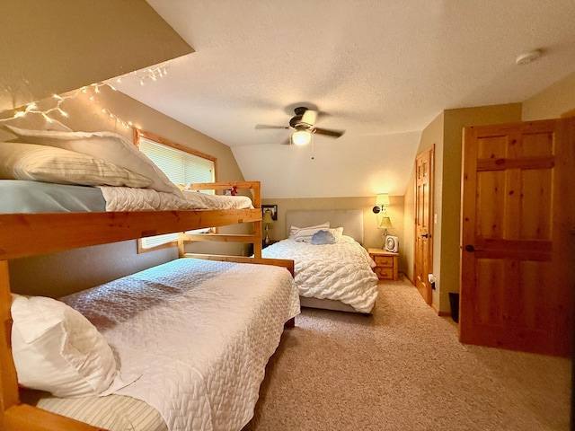 49512 202nd Pl, Shamrock Twp, MN 55760 - carpeted bedroom featuring a textured ceiling, ceiling fan, and vaulted ceiling