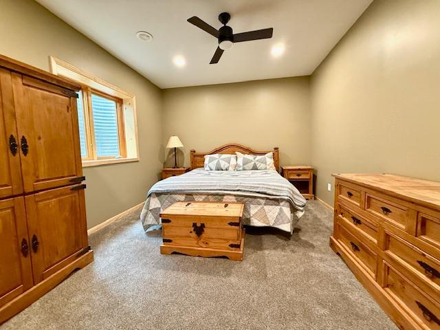 49512 202nd Pl, Shamrock Twp, MN 55760 - carpeted bedroom with ceiling fan and recessed lighting