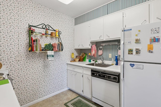 5440 Three Points Blvd Unit 531, Mound, MN 55364 - kitchen with white appliances, light countertops, white cabinets, and wallpapered walls