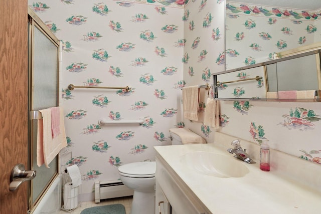 5440 Three Points Blvd Unit 531, Mound, MN 55364 - full bath with a baseboard heating unit, wallpapered walls, vanity, tile patterned floors, and combined bath / shower with glass door