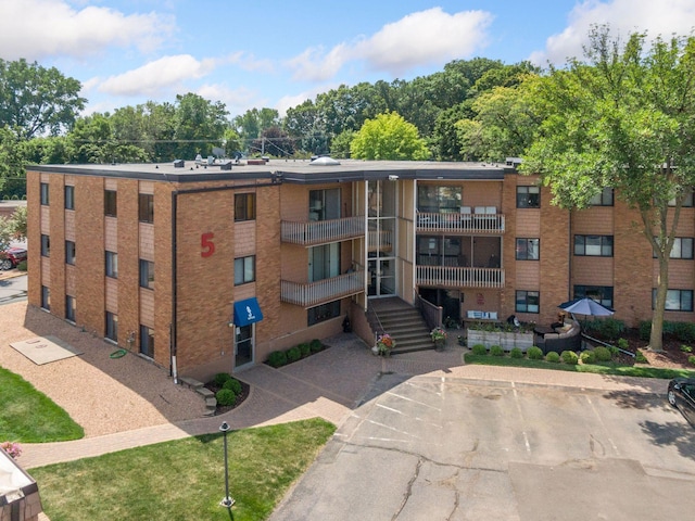 5440 Three Points Blvd Unit 531, Mound, MN 55364 - view of property with uncovered parking