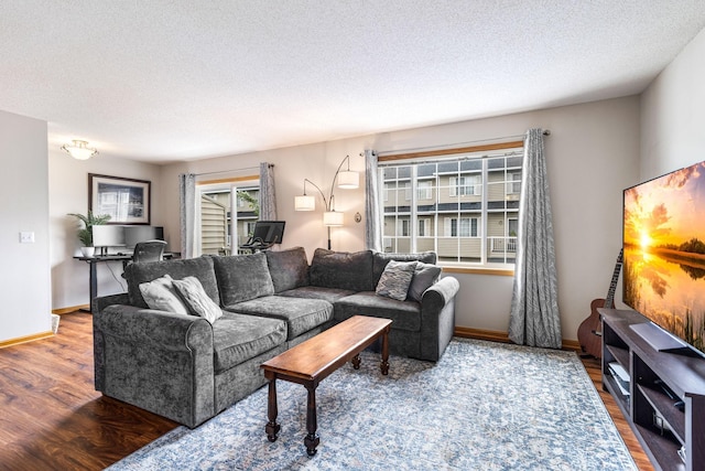 2533 Cobble Hill Ct Unit H, Woodbury, MN 55125 - living area with wood finished floors and a textured ceiling