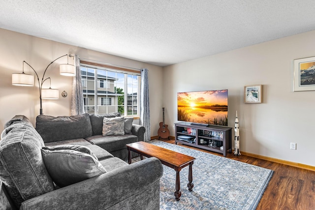 2533 Cobble Hill Ct Unit H, Woodbury, MN 55125 - living room with wood finished floors and a textured ceiling