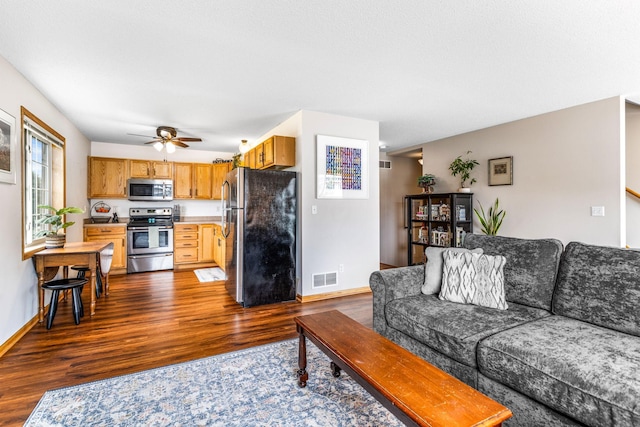 2533 Cobble Hill Ct Unit H, Woodbury, MN 55125 - living area with dark wood finished floors and ceiling fan