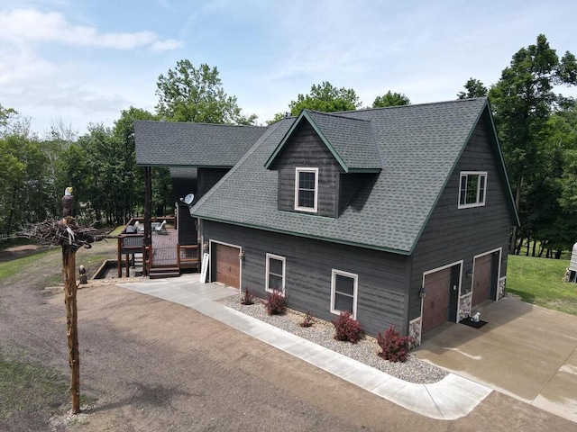 2406 Augusta Rd, Fair Haven Twp, MN 55382 - view of front of property featuring a shingled roof, a garage, and concrete driveway