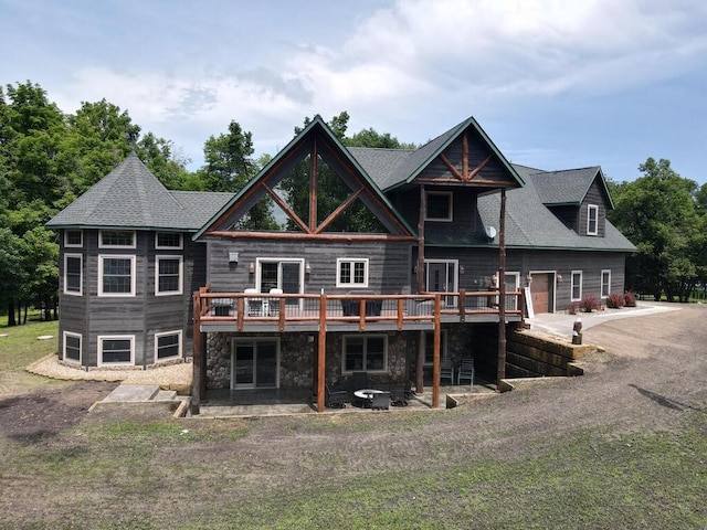 2406 Augusta Rd, Fair Haven Twp, MN 55382 - rear view of house featuring a deck and stone siding