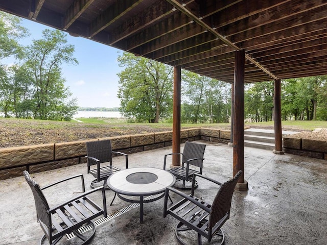 2406 Augusta Rd, Fair Haven Twp, MN 55382 - view of patio / terrace with a water view