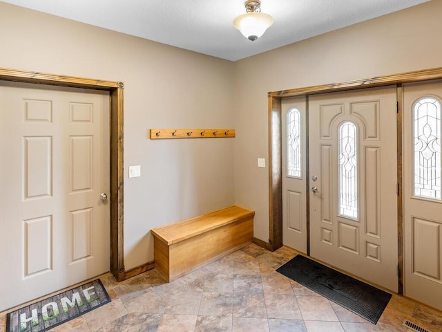 2406 Augusta Rd, Fair Haven Twp, MN 55382 - entrance foyer with baseboards and light stone finish flooring